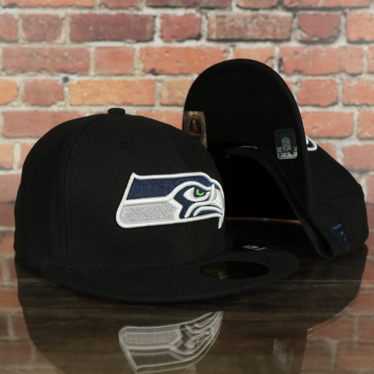 front and bottom of the Seattle Seahawks Black Underbrim 59Fifty Fitted Cap | Black Fitted Cap