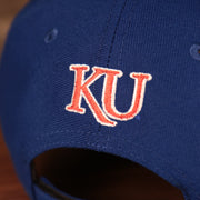 Close up of the University of Kansas logo on the back of the Kansas Jayhawks The League 940 9Forty Adjustable Dad Hat
