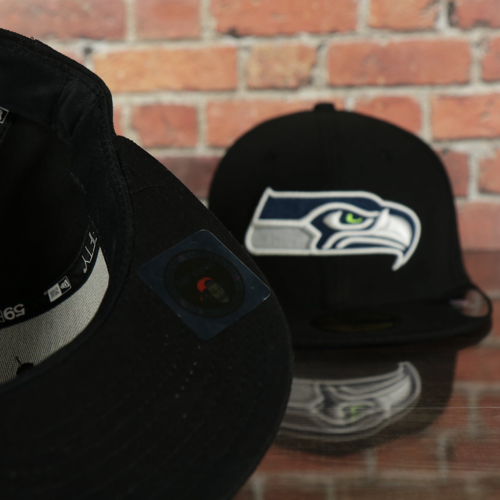 black underside of the Seattle Seahawks Black Underbrim 59Fifty Fitted Cap | Black Fitted Cap