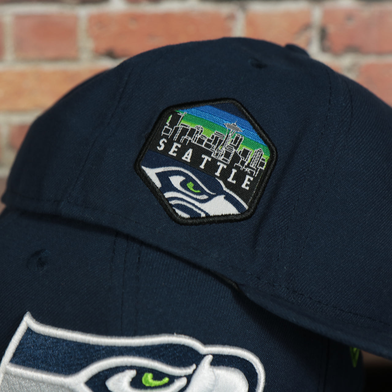 Seattle skyline side patch on the side of the Seattle Seahawks Seattle Skyline Side patch Navy Blue Underbrim 59Fifty Fitted Cap | Navy Blue Fitted Cap