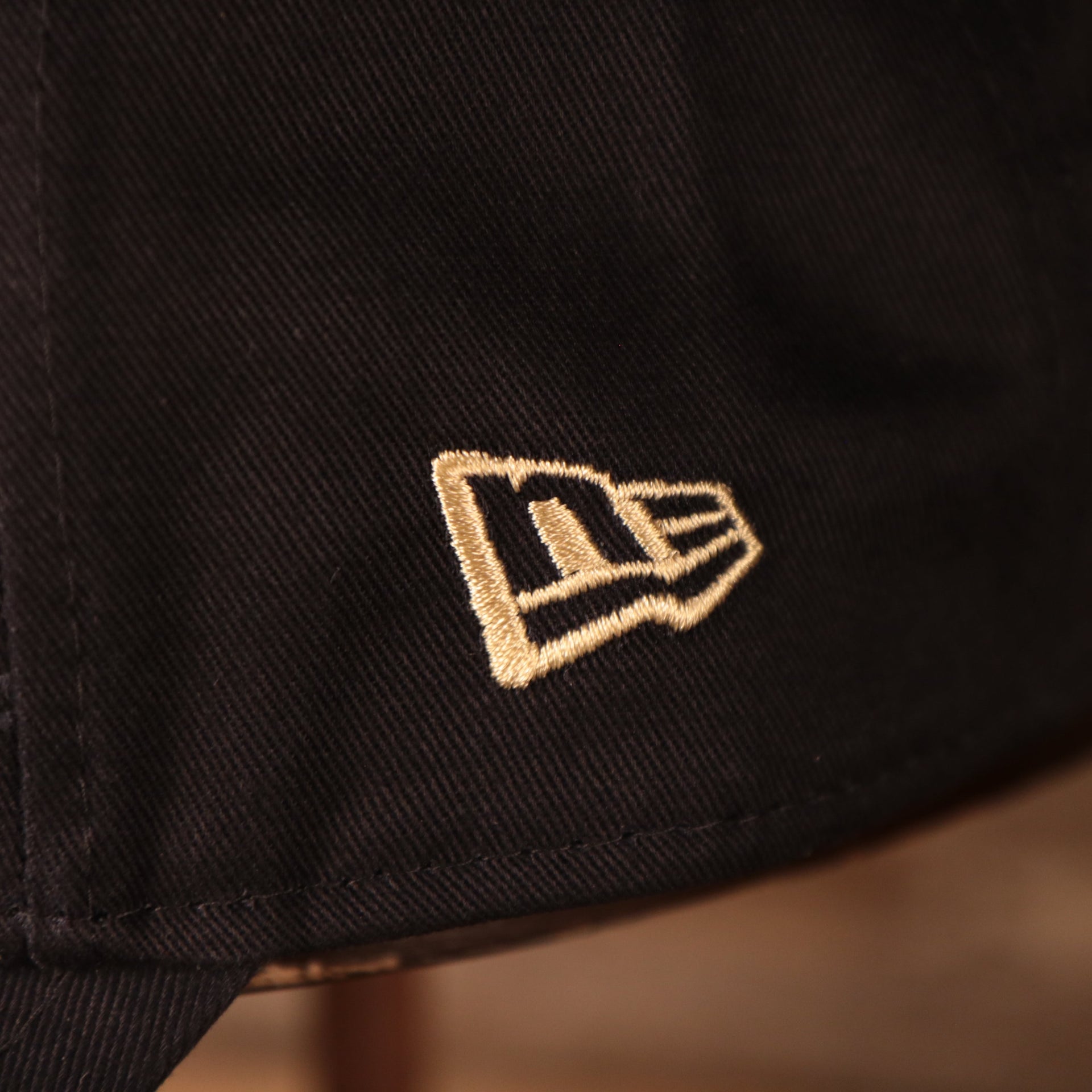Close up of the New Era logo embroidered on the Pittsburgh Panthers The League 940 9Forty Adjustable Dad Hat