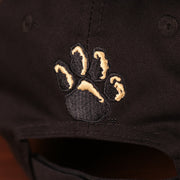 Close up of the paw print logo embroidered on the back of the Pittsburgh Panthers The League 940 9Forty Adjustable Dad Hat