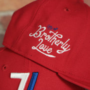 city of brotherly love side patch on the wearers right side of the Philadelphia 76ers 2022 City Edition Vintage 76 Logo Gray Bottom Youth 9Fifty Side Patch Snapback Cap | New Era, Red