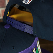 backside of the New Orleans Pelicans 2022 City Edition NOLA Logo Yellow Bottom Youth 9Fifty Side Patch Snapback Cap | New Era, Navy