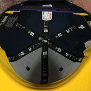 inside taping on the inside of the New Orleans Pelicans 2022 City Edition NOLA Logo Yellow Bottom Youth 9Fifty Side Patch Snapback Cap | New Era, Navy