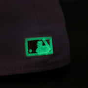 Close up of the glow in the dark batterman logo on the Philadelphia Phillies Glow In The Dark 1996 All Star Game "il napoletano" Sky Blue Bottom Side Patch 59Fifty Fitted Cap