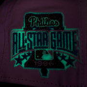 Close up of the glow in the dark sidepatch on the Philadelphia Phillies Glow In The Dark 1996 All Star Game "il napoletano" Sky Blue Bottom Side Patch 59Fifty Fitted Cap
