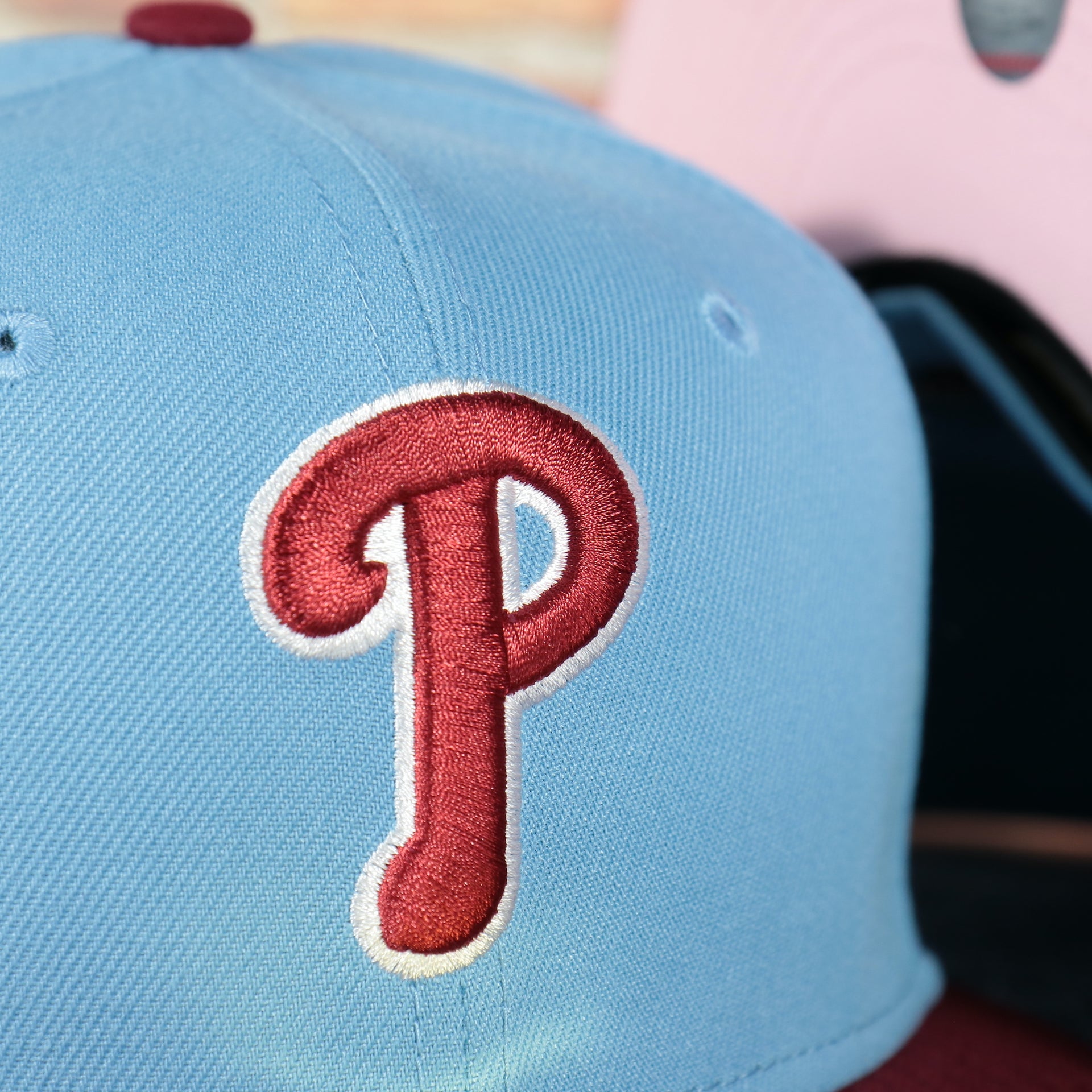 Close up of the Philadelphia Phillies logo on the Philadelphia Phillies 2008 World Series Side Patch Cooperstown Pink Bottom 59Fifty Fitted Cap | Sky Blue