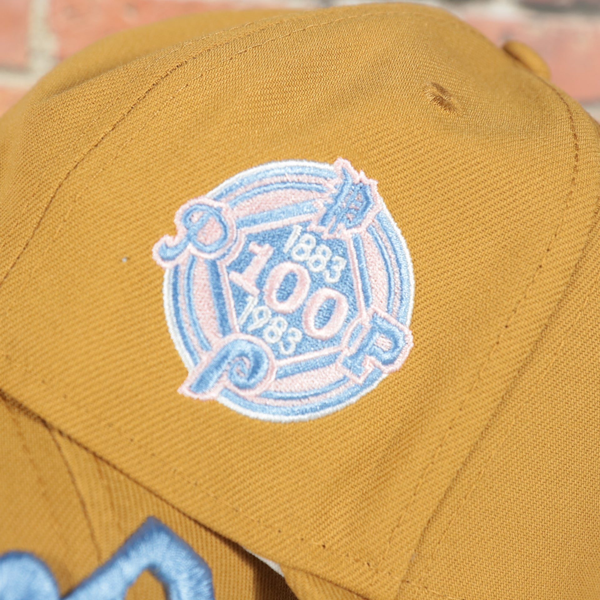 100th anniversary side patch on the Philadelphia Phillies Cooperstown 1910 Logo 100th Anniversary Side Patch Icy Blue UV 59Fifty Fitted Cap | "English Toffee" Hoagie Pack