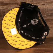 under side of the Pittsburgh Steelers x Gatorade Black 9Fifty Yellow Bottom Snapback