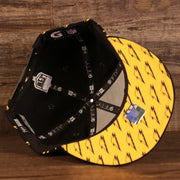 underside of the Pittsburgh Steelers x Gatorade Black 9Fifty Yellow Bottom Snapback