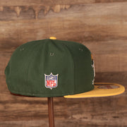 Wearer's right of the Green Bay Packers 1968-1979 Throwback Logo Vintage NFL 9Fifty Snapback Hat