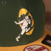 Close up retro logo of the Green Bay Packers 1968-1979 Throwback Logo Vintage NFL 9Fifty Snapback Hat