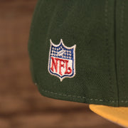 Close up of the NFL shield on the Green Bay Packers 1968-1979 Throwback Logo Vintage NFL 9Fifty Snapback Hat