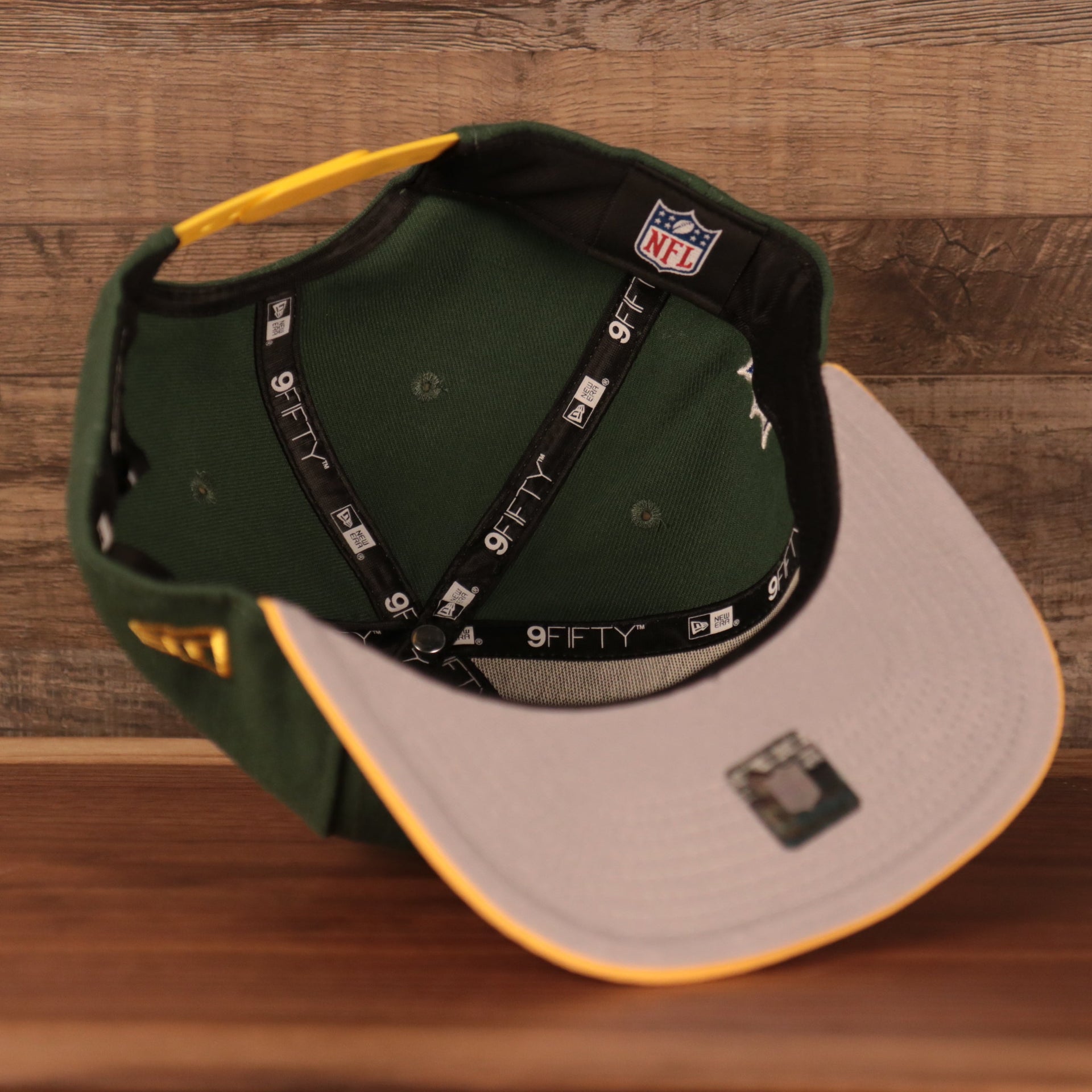 Interior of the Green Bay Packers 1968-1979 Throwback Logo Vintage NFL 9Fifty Snapback Hat