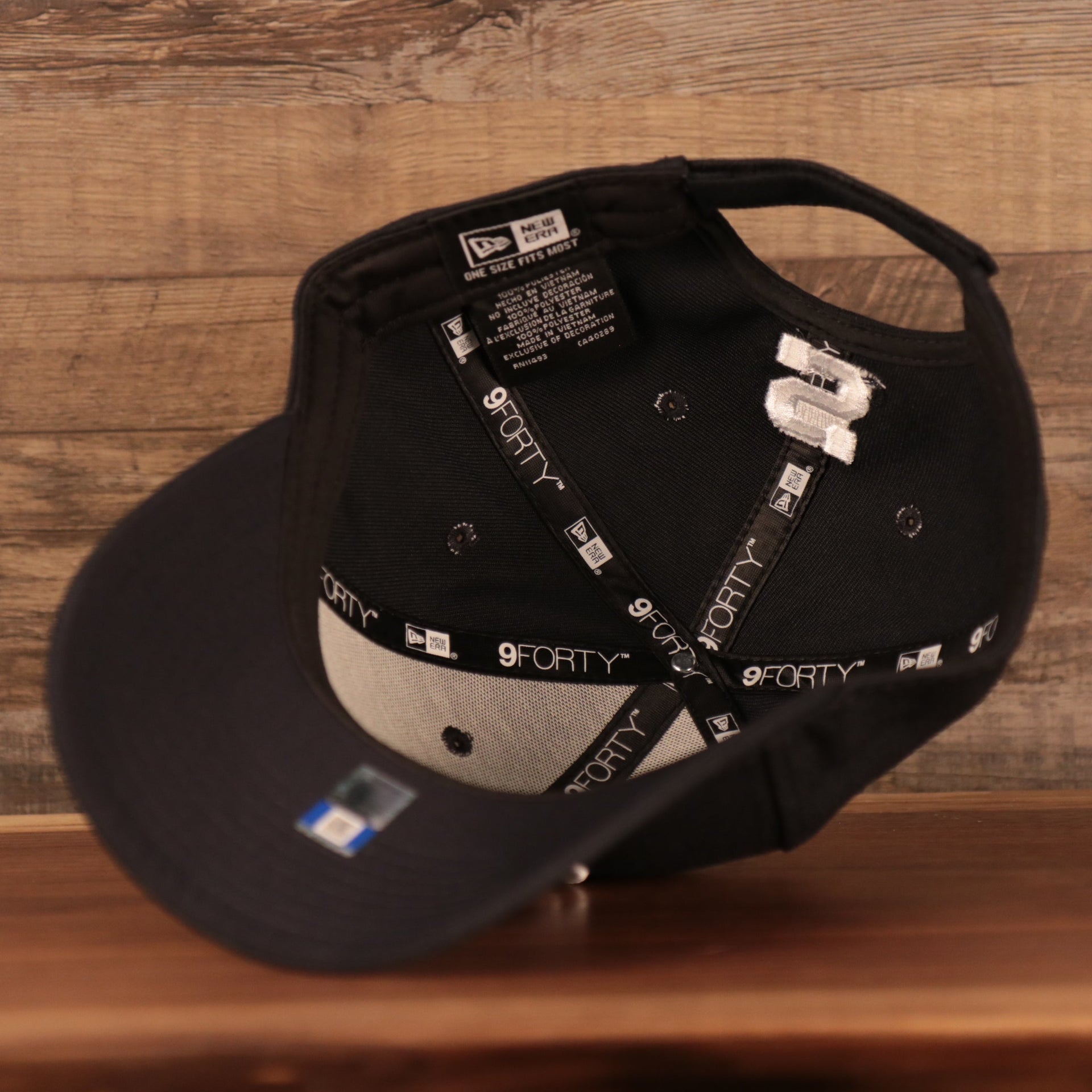 Navy blue under visor of the Penn State Nittany Lions The League 940 9Forty Adjustable Dad Hat
