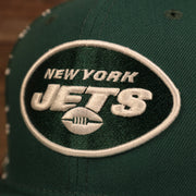 logo on the New York Jets x Gatorade Green 9Fifty White Bottom Snapback