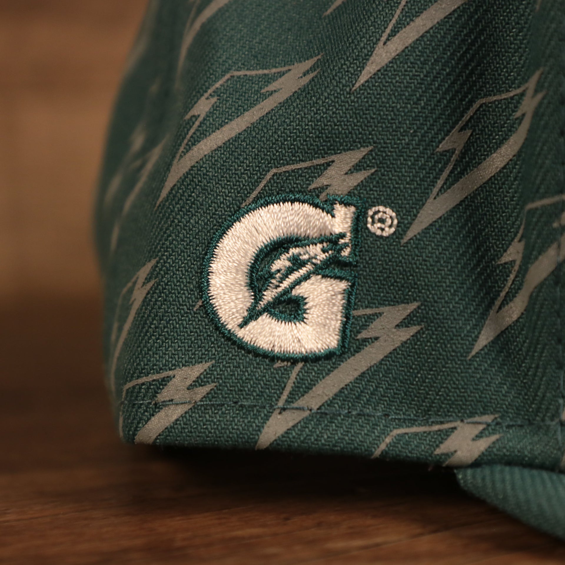 Gatorade logo on the Philadelphia Eagles x Gatorade Green 9Fifty Grey Bottom Snapback