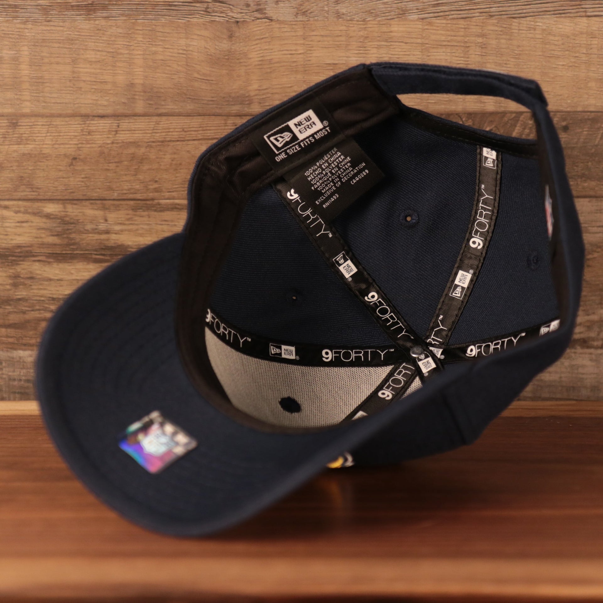 Navy blue under visor of the Los Angeles Chargers The League 940 9Forty Adjustable Dad Hat