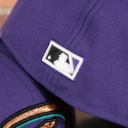 cooperstown batterman logo on the 2001 World Series Arizona Diamondbacks Cooperstown Grape 5 Side Patch Fitted | Purple 59Fifty Teal Bottom Fitted Cap