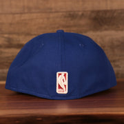 NBA logo on the Philadelphia 76ers Grey Bottom | Royal Blue 59Fifty Fitted Cap