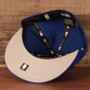new era taping on the Philadelphia 76ers Grey Bottom | Royal Blue 59Fifty Fitted Cap