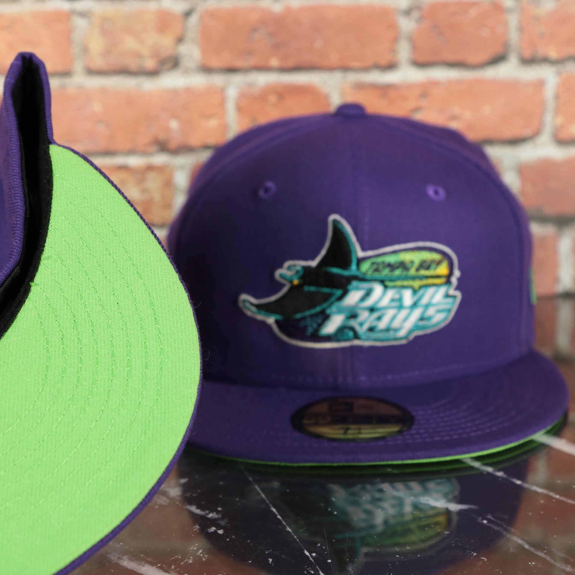 neon green under visor on the Tampa Bay Devil Rays 1998 Inaugural Season Side Patch Purple 59Fifty Green Bottom Fitted Cap | Donatello Pack
