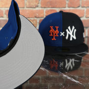 grey under visor on the New York Yankees x Mets Split Crown Grey Bottom 59fifty Side Patch Fitted | Navy/Royal Blue Yankees x Mets 5950 Cap