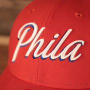 Script Phila lettering on the front of the Philadelphia 76ers Phila Script Side Patch 940 9Forty Dad Hat