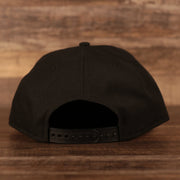 Back of the Philadelphia Phillies Black on Black Tonal Grey Bottom 9Fifty Snapback Hat