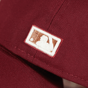 cooperstown batterman logo on the Philadelphia Athletics Glow In the Dark 1929 World Series Side Patch Pink Bottom Cardinal 5950 Fitted Cap | Pumpkin Wine