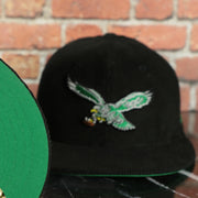 green under visor on the Philadelphia Eagles Throwback Veterans Stadium Side Patch Black Corduroy Kelly Green Bottom 59Fifty Fitted Cap | Corduroy Fitted Pack
