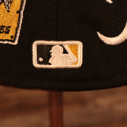 Close up of the MLB Batterman logo on the Pittsburgh Pirates "Patch Pride" All Over Gray Bottom Side Patch 59Fifty Fitted Cap