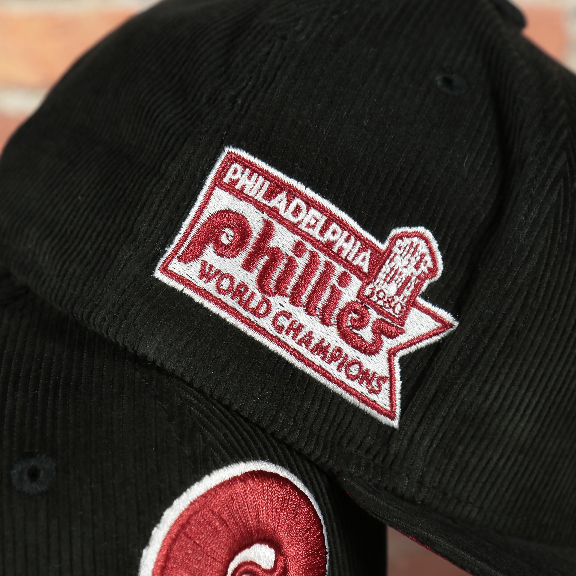 1980 world champions patch on the Philadelphia Phillies Cooperstown World Champions Side Patch Black Maroon Bottom Corduroy 59Fifty Fitted Cap | Corduroy Fitted Pack