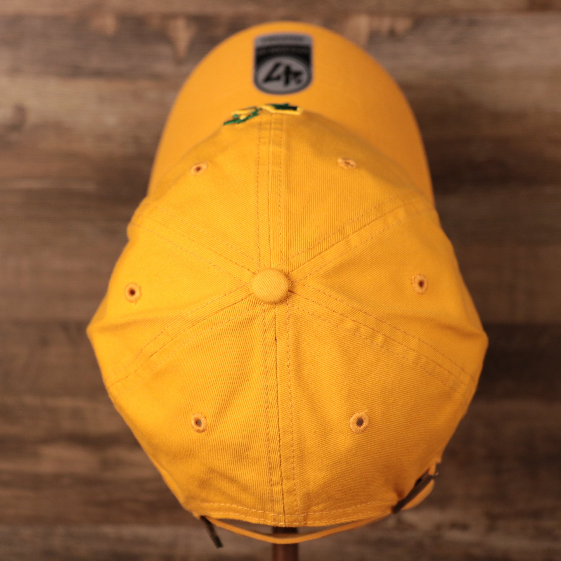 top of the Minnesota North Stars Yellow Adjustable Retro Dad Hat