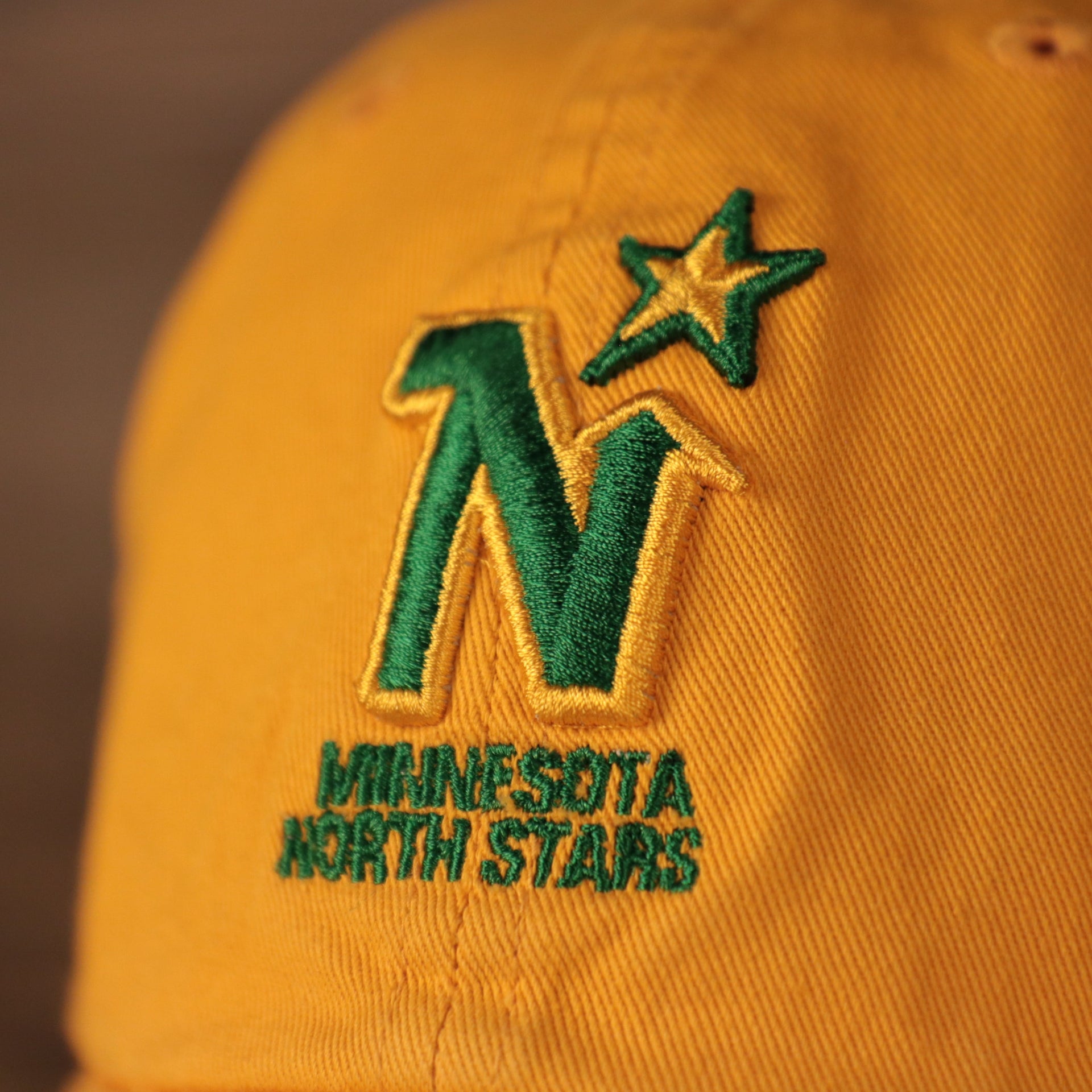 north stars logo Minnesota North Stars Yellow Adjustable Retro Dad Hat