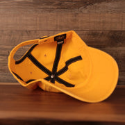 underside of the Minnesota North Stars Yellow Adjustable Retro Dad Hat