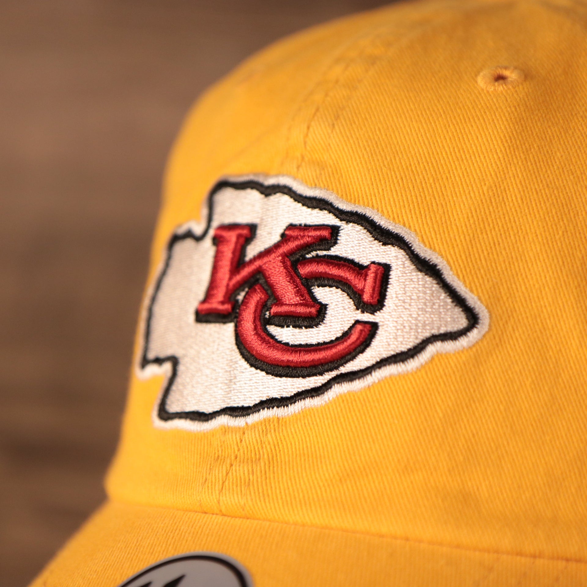 logo shot on the Kansas City Chiefs Yellow Adjustable Dad Hat