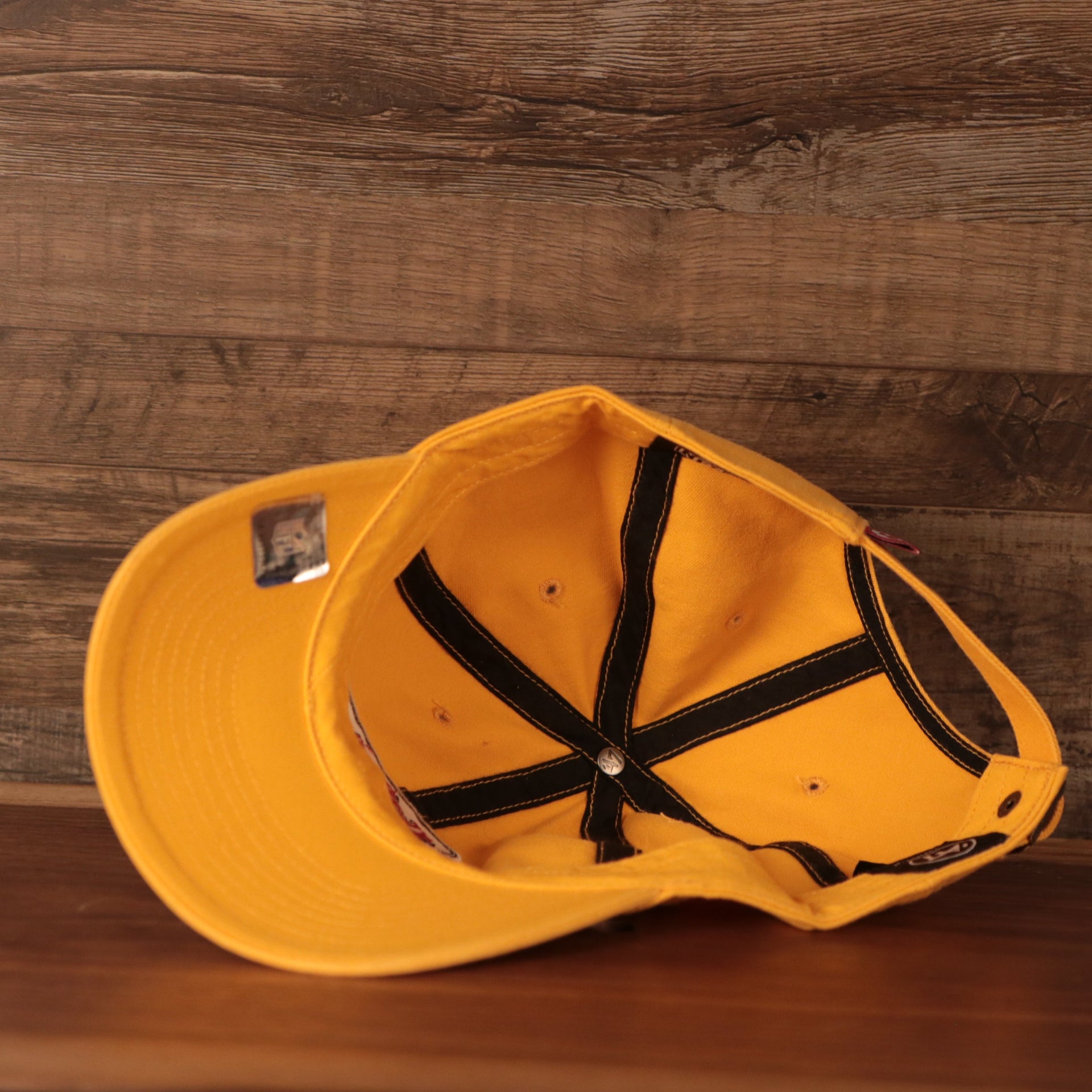 underside of the Kansas City Chiefs Yellow Adjustable Dad Hat