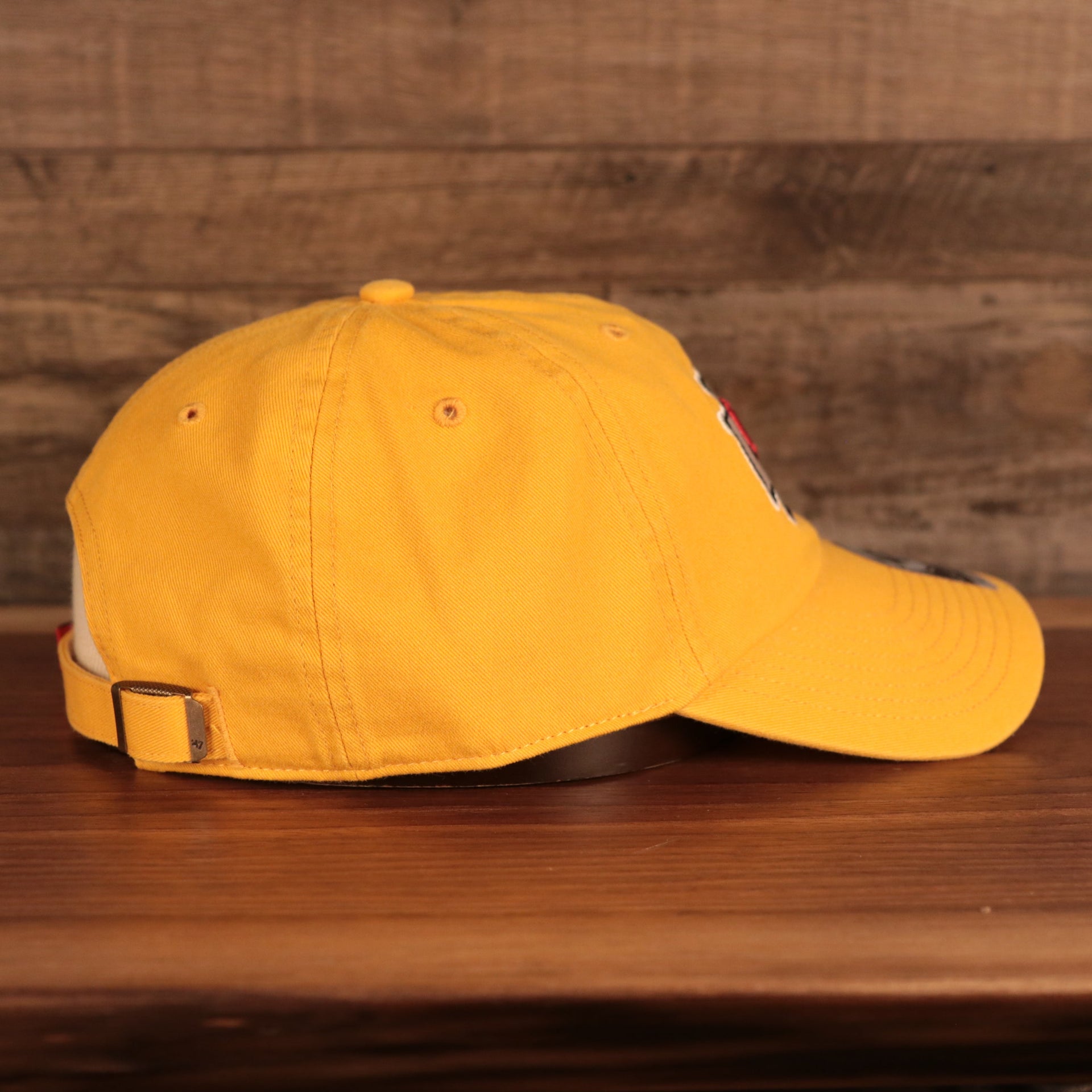 wearers right side of the Kansas City Chiefs Yellow Adjustable Dad Hat