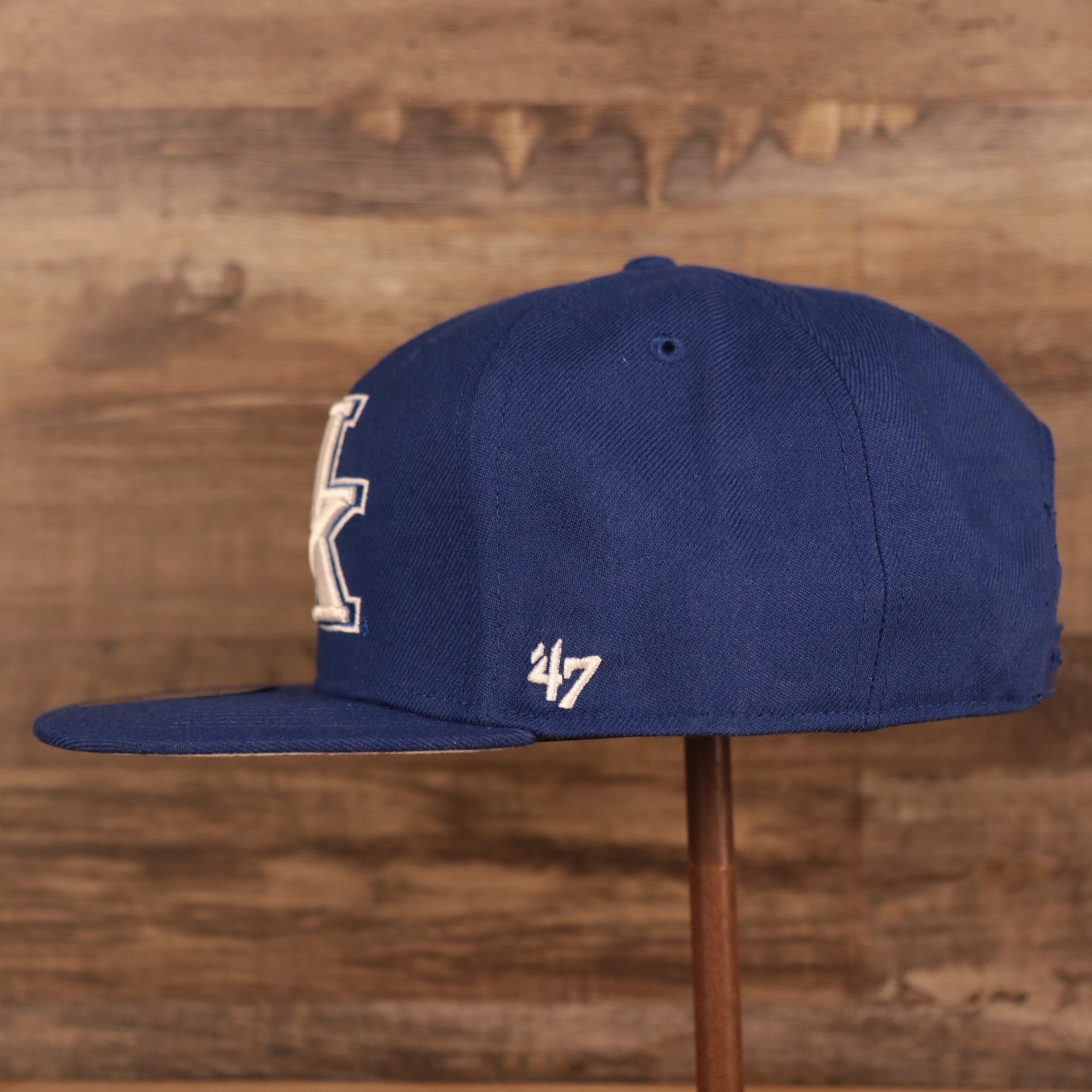 wearers left side of the Kentucky Wildcats Royal Blue Adjustable Snapback Hat
