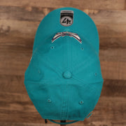 top view of the Charlotte Hornets Cyan Adjustable Dad Hat