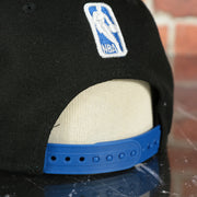 blue adjustable snap on the Orlando Magic Logo Spill XL Outline New Era 9Fifty Snapback Hat