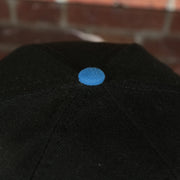 blue button on the Orlando Magic Logo Spill XL Outline New Era 9Fifty Snapback Hat