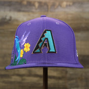 The front of the Cooperstown Arizona Diamondbacks Gray Bottom Bloom Spring Embroidery 59Fifty Fitted Cap | Purple 59Fifty Cap