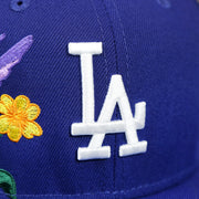 The Dodgers Logo on the Los Angeles Dodgers Gray Bottom Bloom Spring Embroidery 59Fifty Fitted Cap | Royal Blue 59Fifty Cap