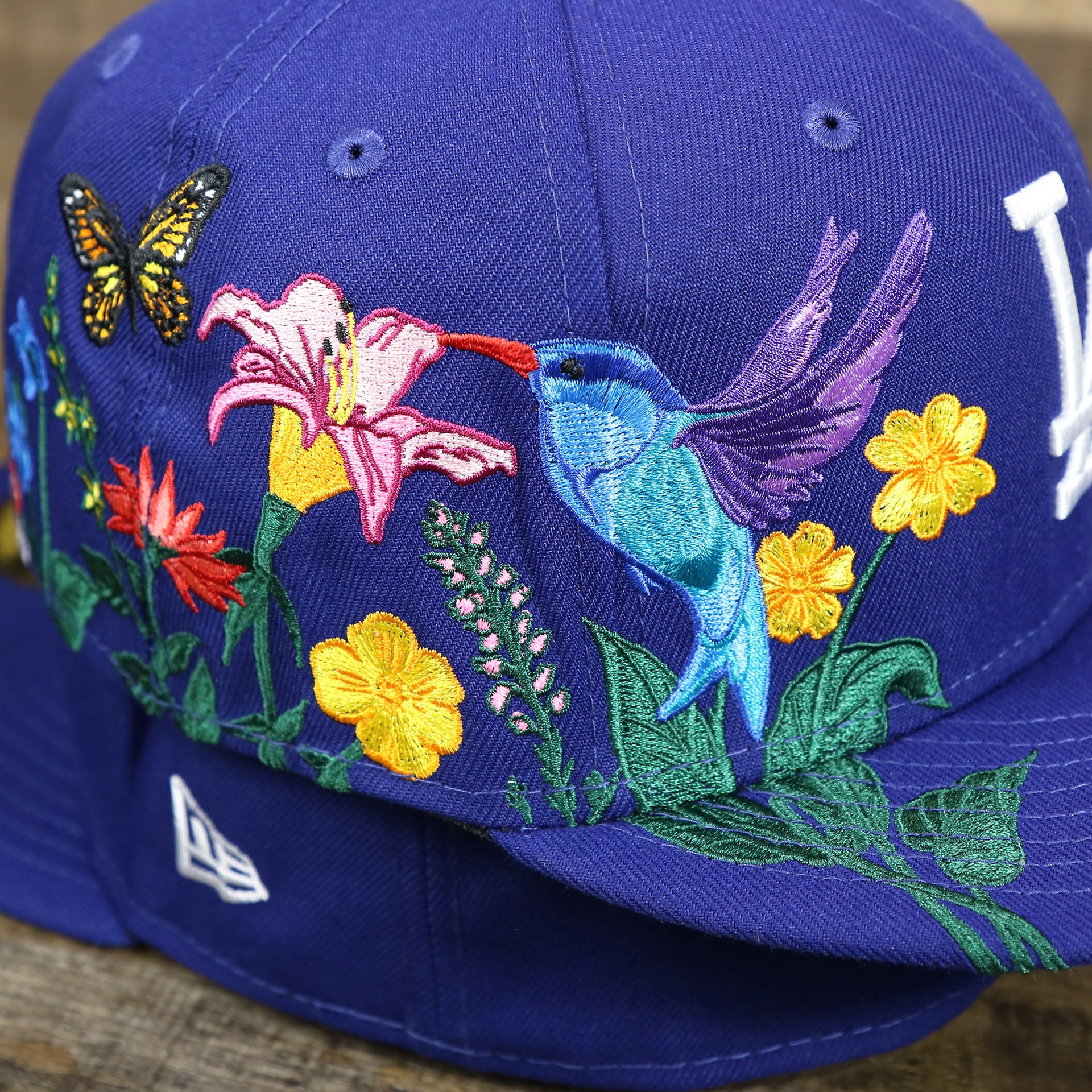 The Bloom Embroidery on the Los Angeles Dodgers Gray Bottom Bloom Spring Embroidery 59Fifty Fitted Cap | Royal Blue 59Fifty Cap