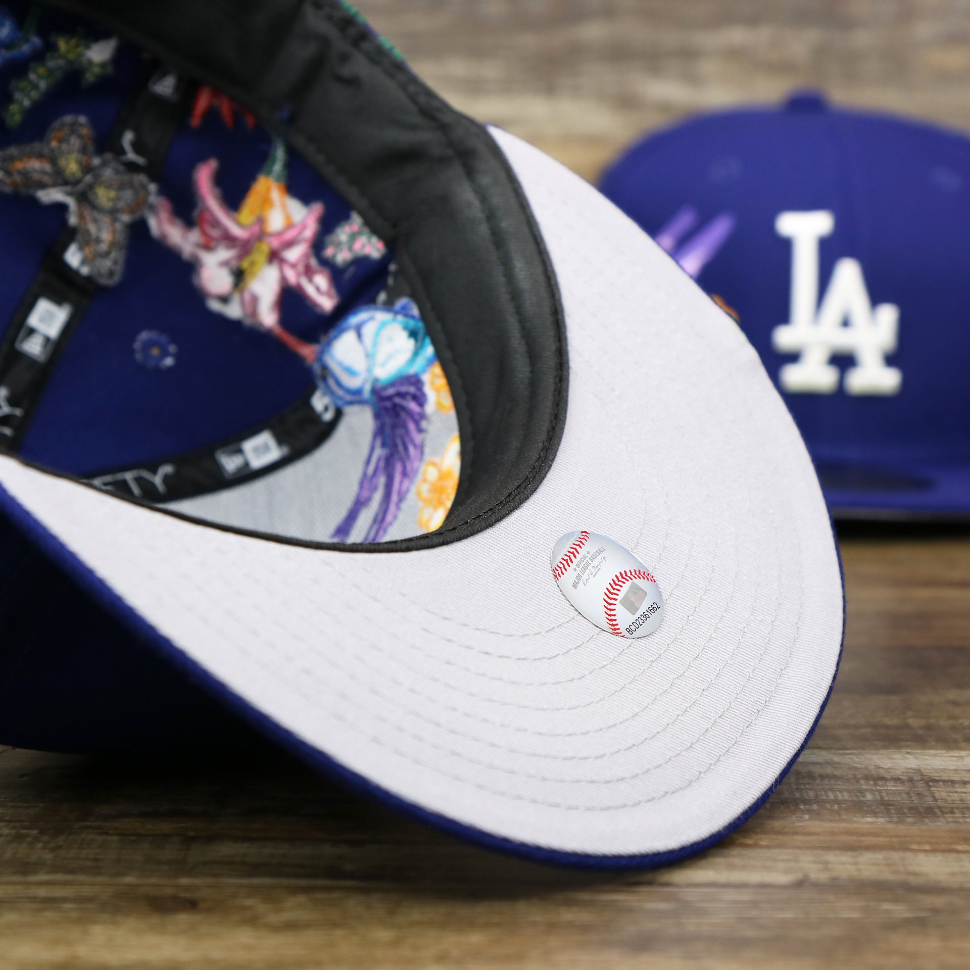 The undervisor on the Los Angeles Dodgers Gray Bottom Bloom Spring Embroidery 59Fifty Fitted Cap | Royal Blue 59Fifty Cap