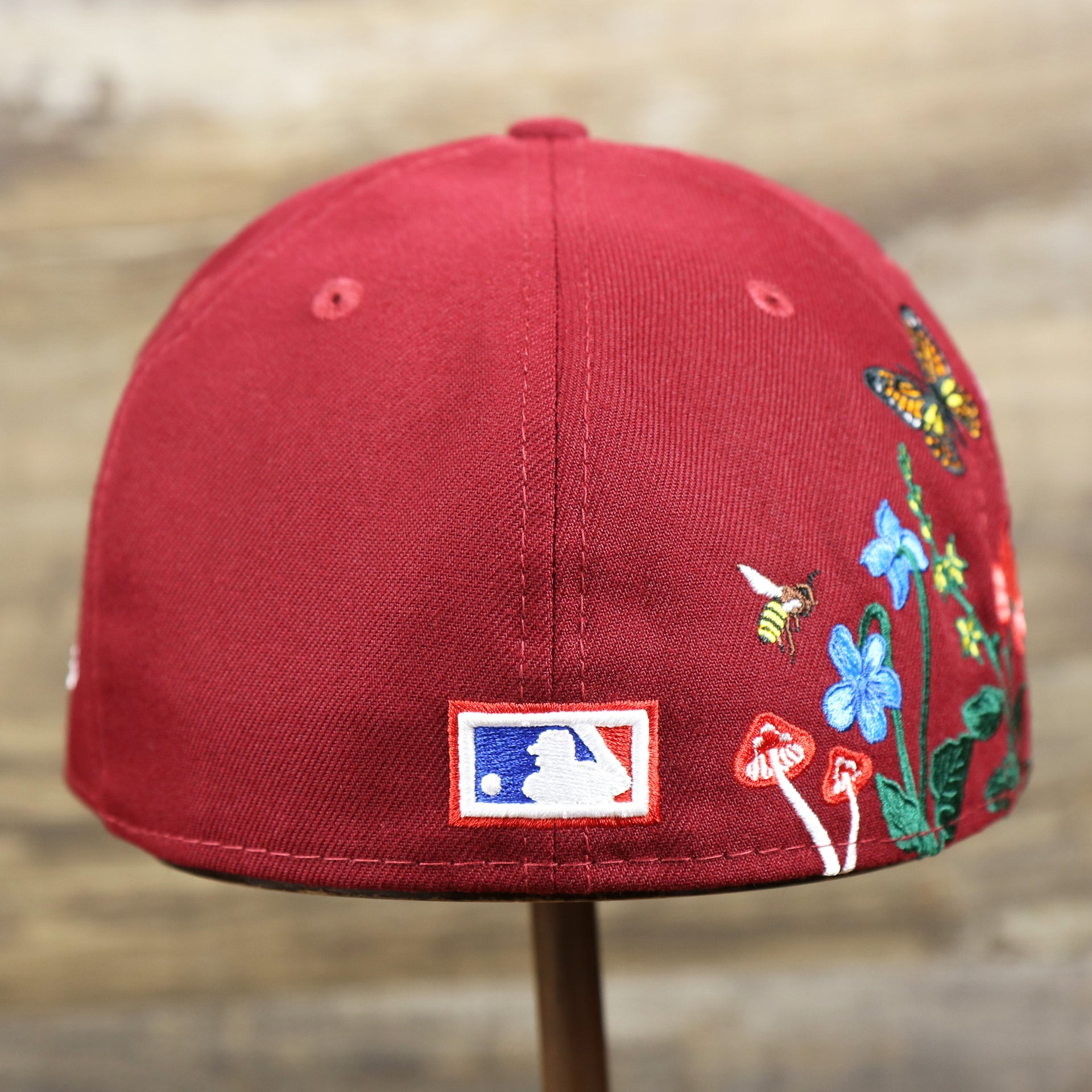 The backside of the Cooperstown Philadelphia Phillies Gray Bottom Bloom Spring Embroidery 59Fifty Fitted Cap | Maroon 59Fifty Cap