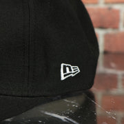 new era logo on the Philadelphia Phillies On Field Black 59Fifty Fitted Cap